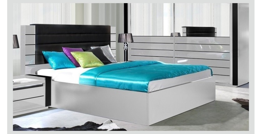 Lit double 160 cm avec option coffre LINA. Coloris blanc et noir brillant avec une finition en simili cuir. Sommier inclus