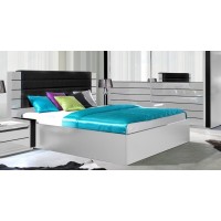 Lit double 180 cm avec option coffre LINA. Coloris blanc et noir brillant avec une finition en simili cuir. Sommier inclus